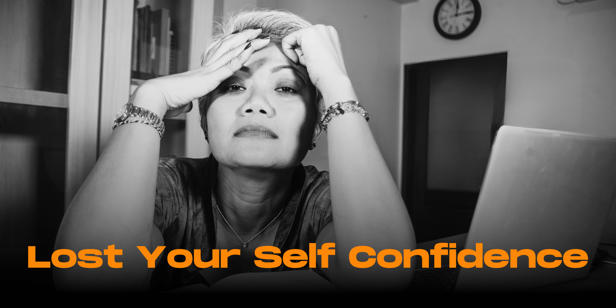 Older Asian woman looking anxious